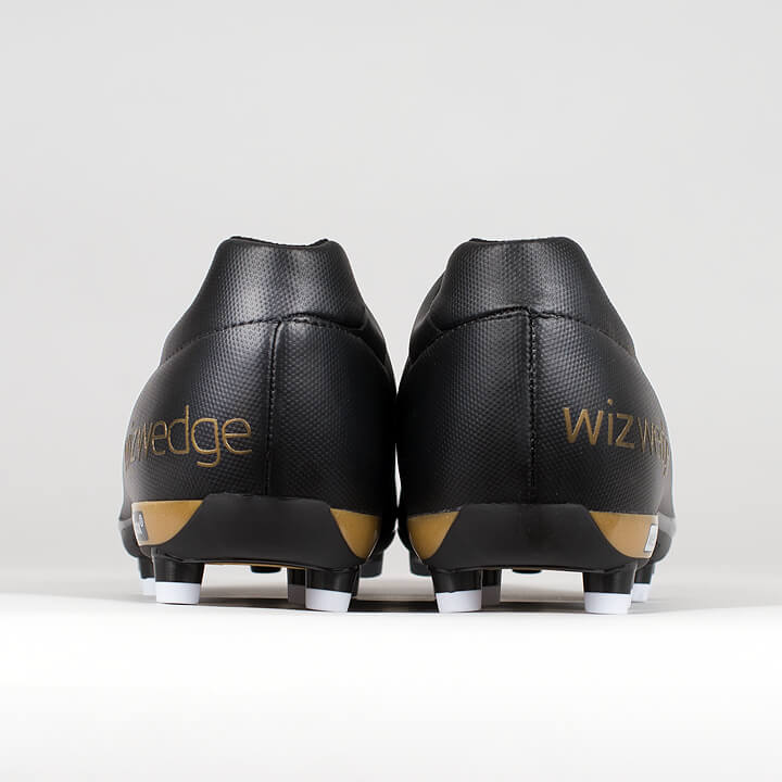 Dos des chaussures de football rugby junior française Wizwedge Wave noire à crampons moulés pour douleur tendon d'achille