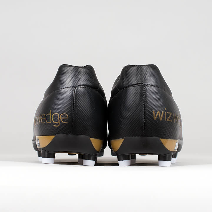 Dos des chaussures de football rugby française Wizwedge Wave noire à crampons moulés pour douleur tendon d'achille