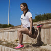 Chaussure de running femme pronatrice sport santé Wizwedge Neon PCS rose portée pour foulée pronatrice